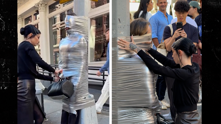 Dominatrix Teams Up With Alexander Wang & Tapes Man To NYC Street Post